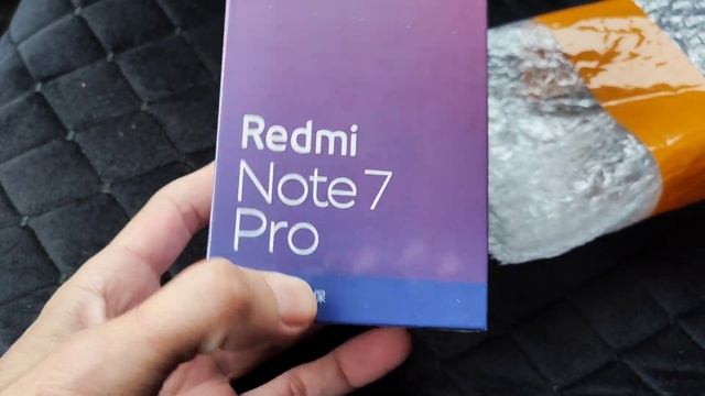 Распаковка нового телефона из Китая Redmi Note 7 Pro 2023. В России не продают. С наступающим вас?. смотреть онлайн