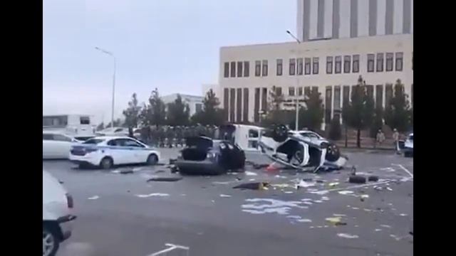 Numerous police vehicles were crushed and overturned Almaty Kazakhstan смотреть онлайн