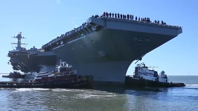 USS Gerald R. Ford (CVN 78) departs the shipyard. смотреть онлайн