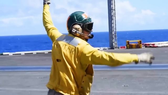 The Insane Hand Signals on an Aircraft Carrier's Flight Deck Explained смотреть онлайн