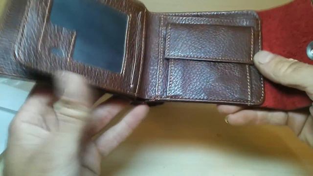 Мужской кошелёк с подарками от продавца купленный на сайте Aliexpress.