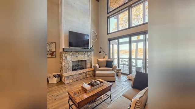 75 Medium Tone Wood Floor Living Space With A Stacked Stone Fireplace Design Ideas You'll Love 🔴 смотреть онлайн