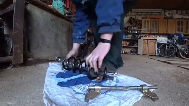 Замена задней пружины в Renault Logan 2