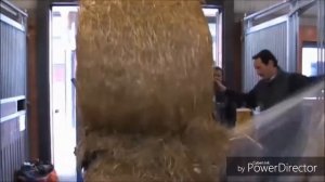 Размотчик рулонов сена