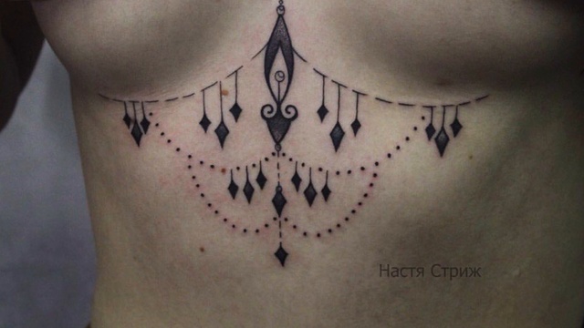 Татуировки под грудью на Tattooink.com.ua