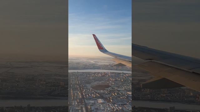 Бесподобный вид с борта самолёта. Река Амур. Благовещинск. Зима. смотреть онлайн