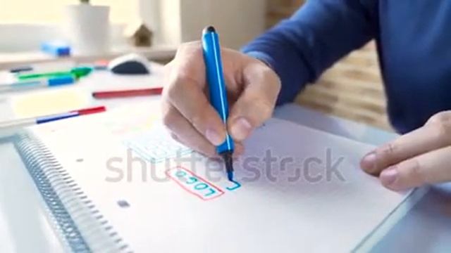 stock footage the mobile application designer drawing sketch of website mobile operating system and смотреть онлайн