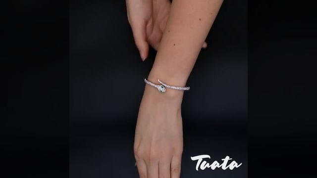 Tuata - Женский жесткий браслет из титанового сплава "Змейка" смотреть онлайн