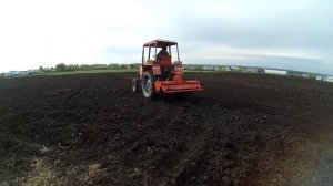 Фрезеровка огорода с помощью трактора т-25 с почвофрезой 1 GQN-160.