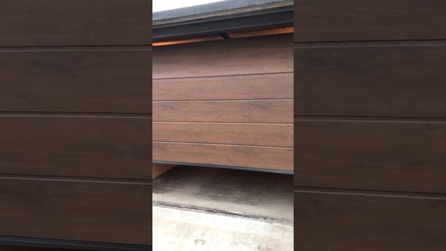 Подъёмно-секционные ворота для гаража фирмы Хорманн смотреть онлайн