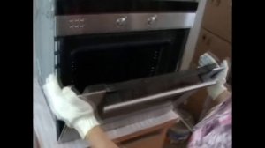 Снимаем дверь духовки