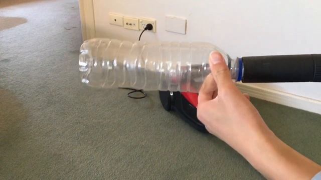 Vacuuming the air out of an empty plastic bottle #QuickExperiments смотреть онлайн