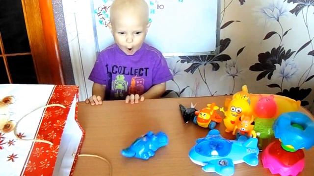РУКА РОБОТ/игрушки с механическим заводом-всетящиеся/ХРЮКАЮЩАЯ СВИНЬЯ//распаковка/играем смотреть онлайн