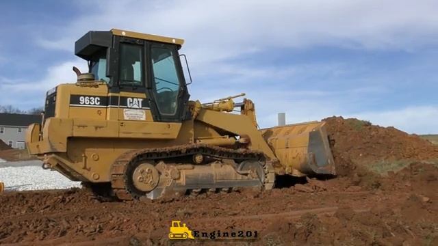 Caterpillar 963 Trackloader Working On A Basement