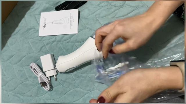 Портативный ирригатор h2ofloss с зарядкой от USB / распаковка смотреть онлайн