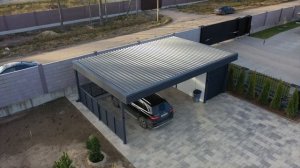 Обзор. Современный навес для машины с хозблоком для двух автомобилей.