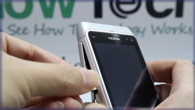 Nokia N8: Inserting the SIM Card смотреть онлайн