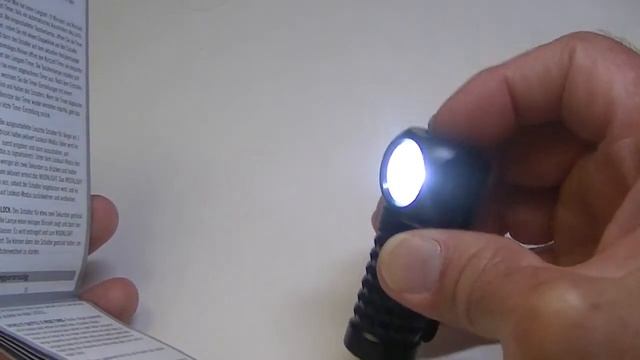 Olight Perun Mini USB Rechargeable Flashlight.