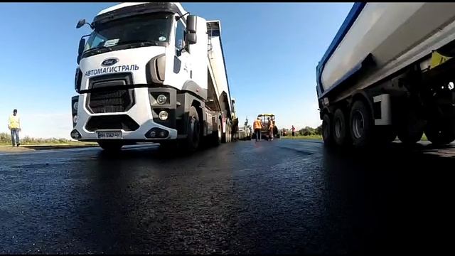 Строительство автодороги Н -31 укатка верхнего слоя ЩМА смотреть онлайн