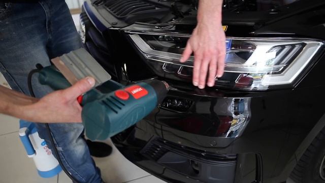 Оклейка автомобиля Audi A8L ультраглянцевой антигравийной плёнкой SunTek смотреть онлайн