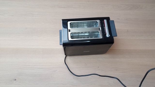 Siemens TT86103 Kompakt Toaster schwarz, 860 W смотреть онлайн