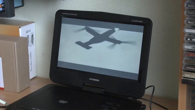 Портативный DVD плеер Hyundai H-LCDVD1002T смотреть онлайн