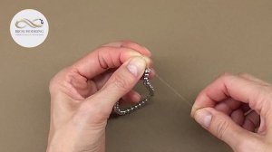 Как завязать узел на эластичной нити (резинке)