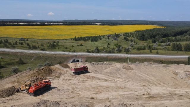 Место где складируют грунт при строительстве новой трассы ведущей к будущему мосту. с. Троицкое смотреть онлайн