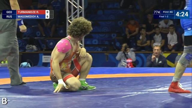 GOLD FS - 61 Kg: R. TURMANIDZE (GEO) V. A. MAGOMEDOV (RUS)