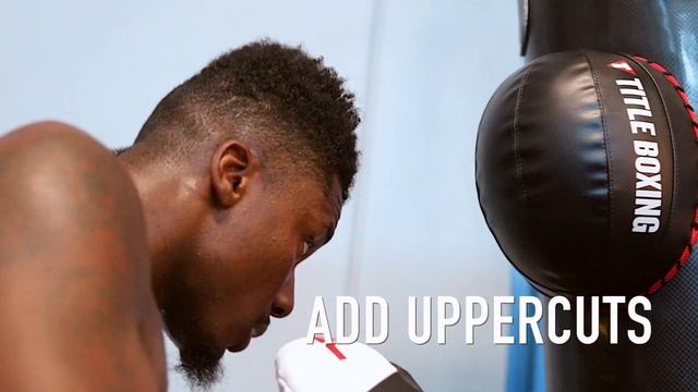 The TITLE Boxing Heavy Bag Strike Foe - TITLE Boxing - Improve Hooks, Range & Uppercuts