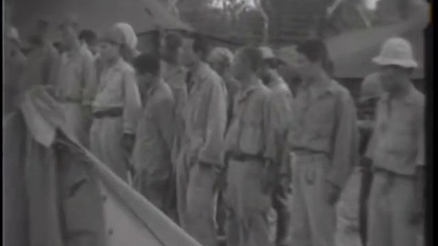 MASS SURRENDER OF JAPANESE TROOPS, OKINAWA, RYUKYU ISLANDS