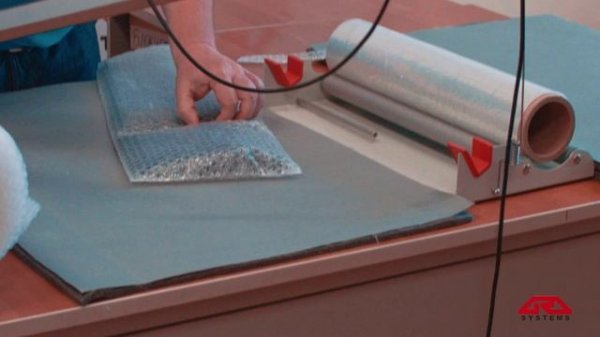 Упаковка калькуляторов iSealer в воздушнопупырчатую пленку