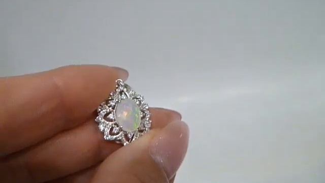 Кулон Натуральный эфиопский опал 7х10 мм Серебро 925 смотреть онлайн