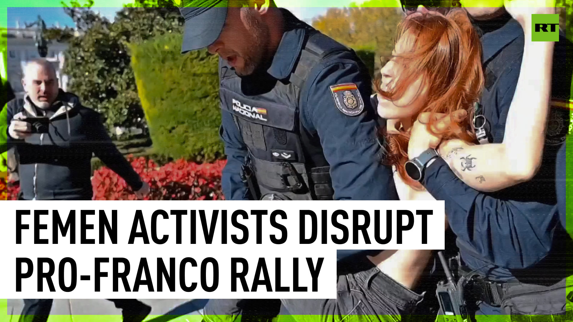 Femen Activists Detained After Attempting To Interrupt Pro-Franco Rally In Madrid