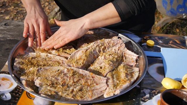 Village Life.  Cooking Fish On Nature