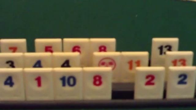 Rummikub (pronounced Rummy-cube)