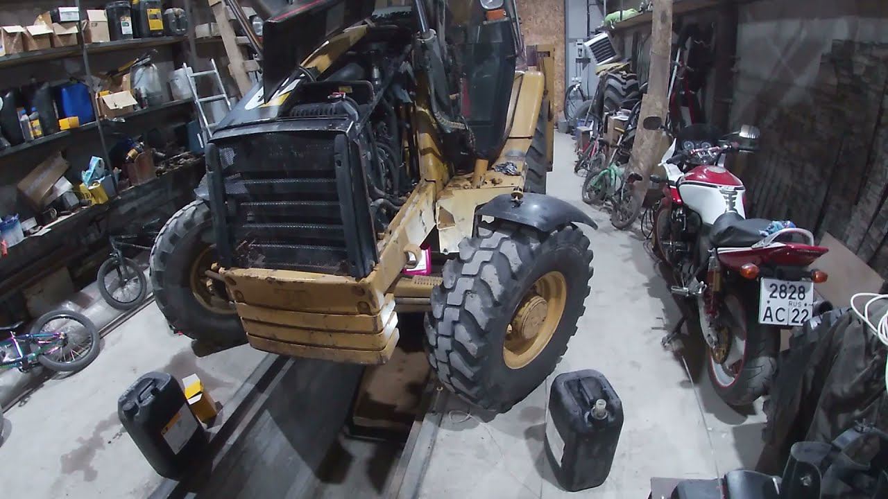 Главные аспекты по замене масла в ДВС, и фильтров. Экскаватор-погрузчик CATERPILLAR 432D смотреть онлайн