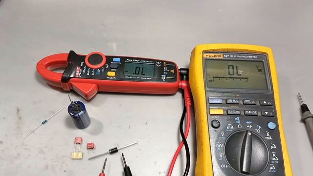 Tang Amper UNI-T UT210E VS FLUKE187 смотреть онлайн