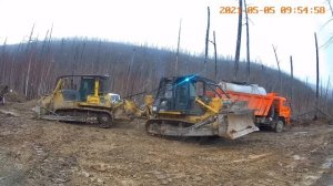Работа в тайге.Бульдозеры.
