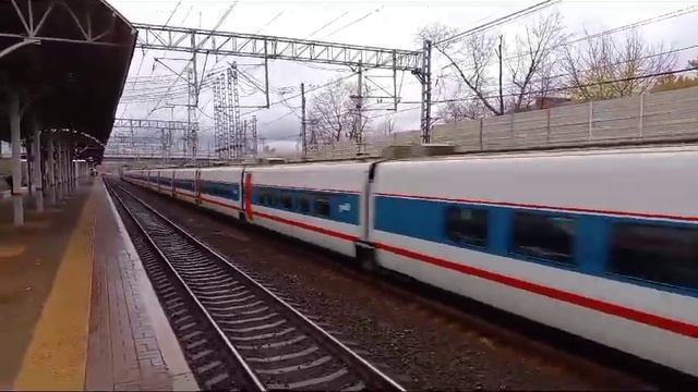 ЭП20 06 с вагонами Стриж на станции Салтыковская смотреть онлайн