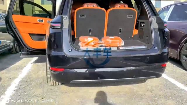 L9 MAX Чёрный автомобиль внутри оранжевого, порт Хоргос, настоящий автомобиль смотреть онлайн