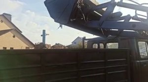 Челюстной ковш в работе.