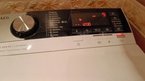 Вертикальная стиральная машина AEG. Сборка Польша.