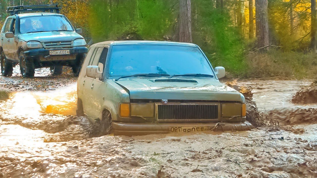 Попали в ловушку Нива Шевроле на 31 тракторах и стоковый Opel Monterey Оффроад в лесу смотреть онлайн
