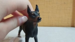 распаковка фигурки собаки