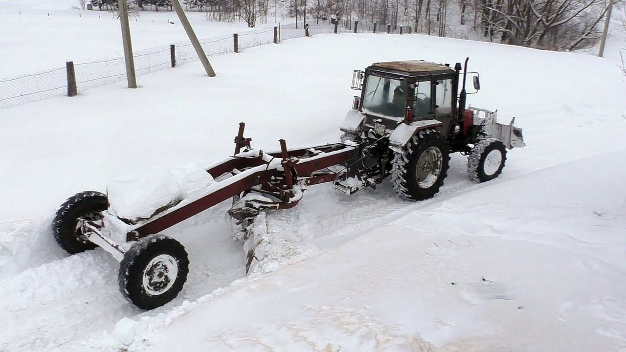 Расчистка снега грейдером. Чуть не скатились в овраг. смотреть онлайн