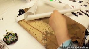 Обработка изнанки купальника для художественной гимнастики после расклейки камней горячей фиксации