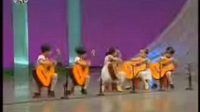 North Korea children playing the guitar Creepy as hell - Китайские Дети играют на гитарах смотреть онлайн