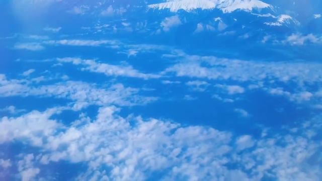 Кавказкие горы с окна самолета за полминуты смотреть онлайн