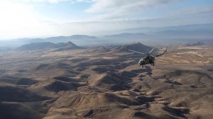 Прикрытие и сопровождение колонн миротворцев ВС РФ вертолетами армейской авиации